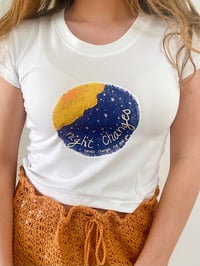 Image 1 of Night changes shirt