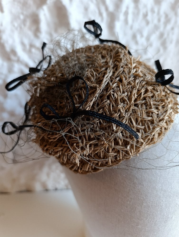Image of Fascinator nido di fiocchi