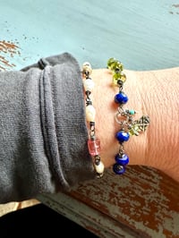 Image 2 of lapis and peridot charm bracelet