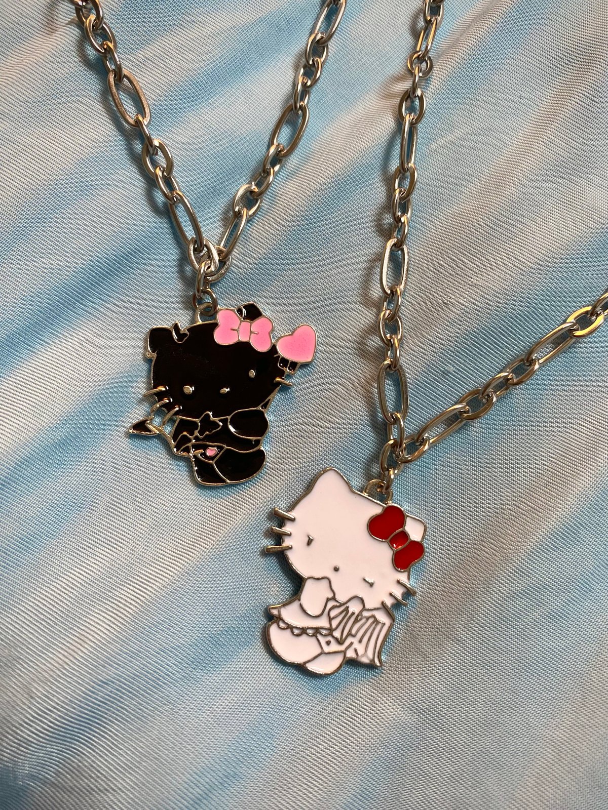 Hello kitty angel and deals devil necklace