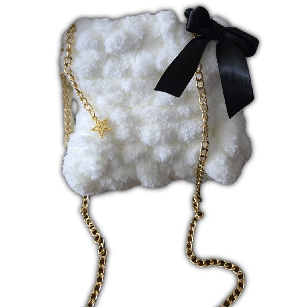 Image of off white fluffy knit purse