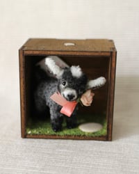 Image 1 of pipe cleaner Pepper the dwarf goat