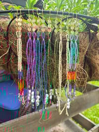 Image 6 of Long beaded green YEM earrings