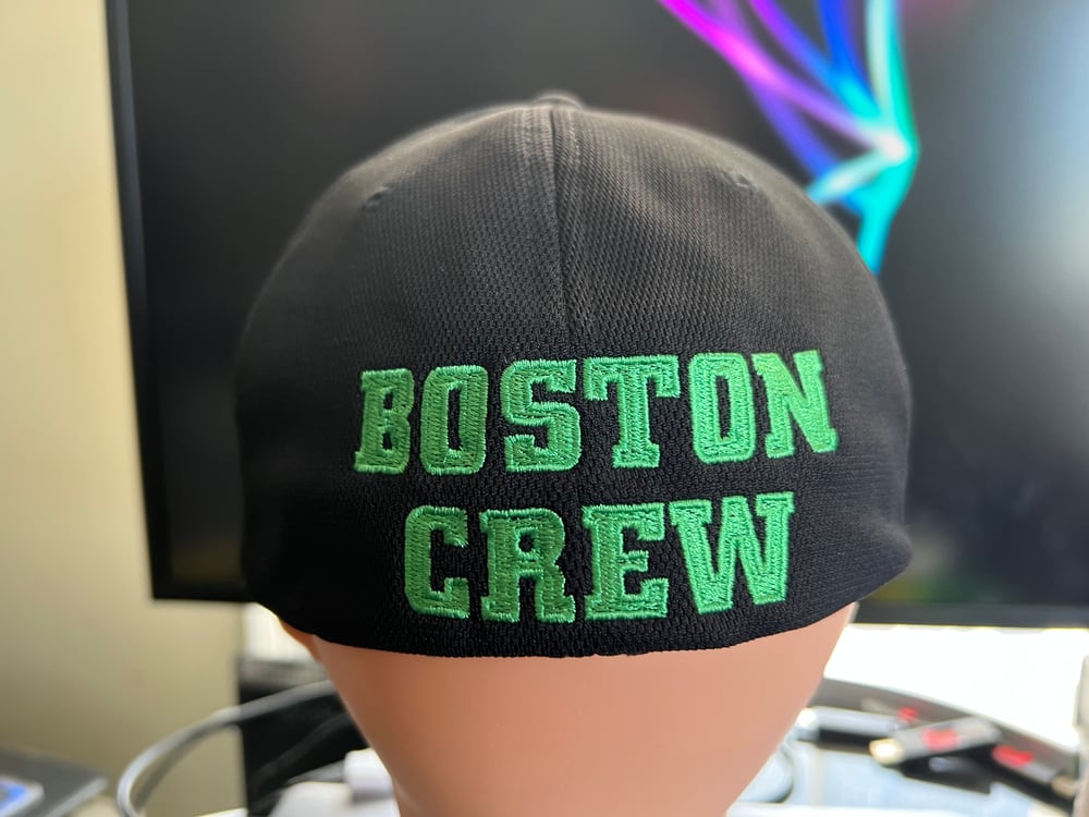 Black Flexfit hat with solid green SSD logo with rear “Boston Crew” logo