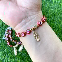 Image 1 of Virgencita with evil eye