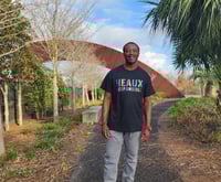 Black HR shirt rainbow letters