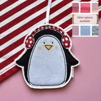 Image 1 of Earmuff  Penguin decoration