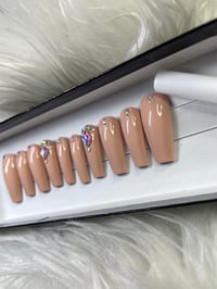 Image 1 of Nude Red Bottoms