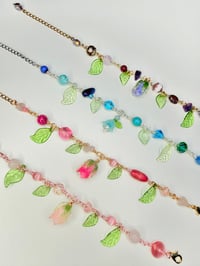 Image 1 of Flower Charm Bracelets