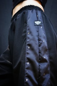 Image 4 of KILA Tracksuit Pants, golden detail