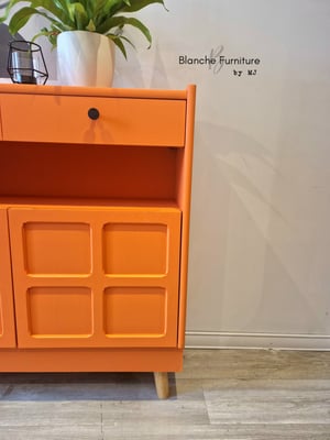 Image of Slim / Narrow hallway Sideboard in Tuscan Orange with black knobs.