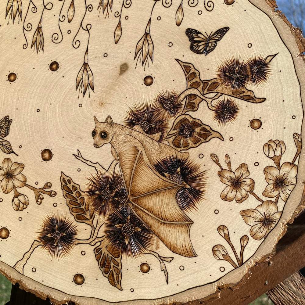 Image of life in the leaves wood art