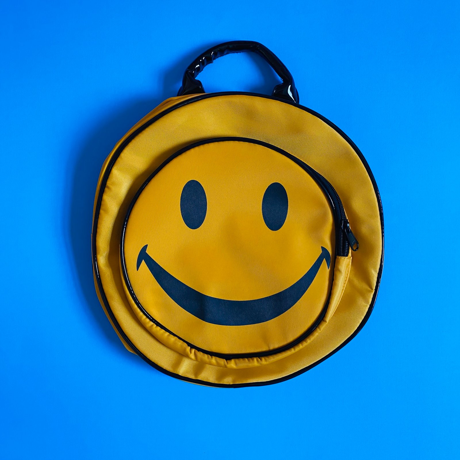 smiley face backpack