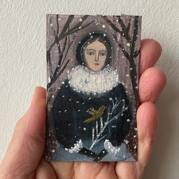 Image of Woman in a snowy scene - tiny painting 