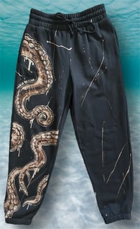 Image 1 of “TENTACLE TALK” BLEACH PAINTED FLEECE JOGGERS MEDIUM