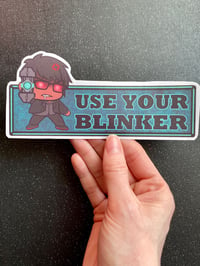 Image 2 of Trigun Stampede Wolfwood “Use Your Blinker” Bumper Sticker