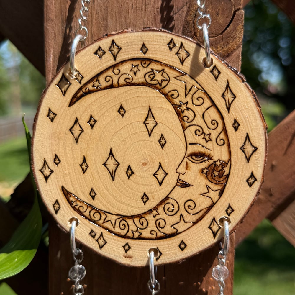 Image of face in the moon sun catcher 