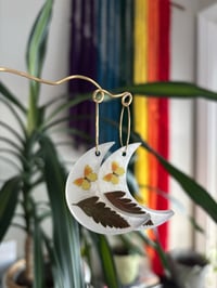 Image 2 of milky butterfly hoops