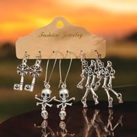 Image 1 of 3 pairs Vintage Silver Skeleton Dangling Earrings