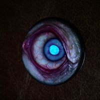 Image 17 of Custom Swappable Phone Grip for smartphones, bright blue reflective pupil, glow in the dark 