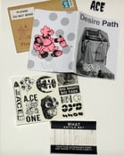 Image of ‘Desire Path’ Special Edition zine with signed print and sticker pack. 