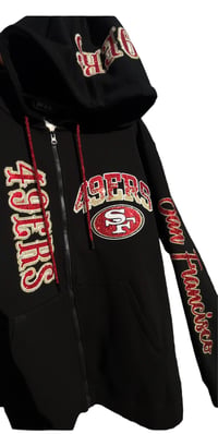Image 1 of Blk And Red Zip Up Football Hoodie