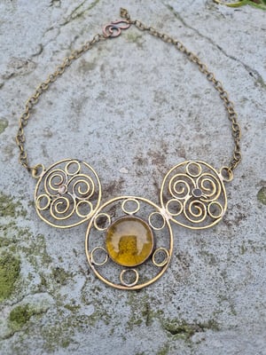 Sun necklace with yellow centre 
