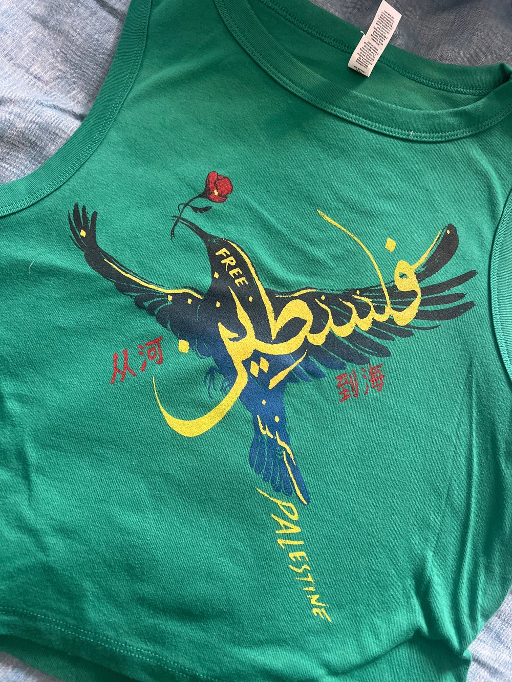 Image of Falasteen 3 language green crop top 