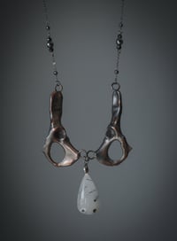Image 1 of Pelvic bones necklace with tourmaline quartz
