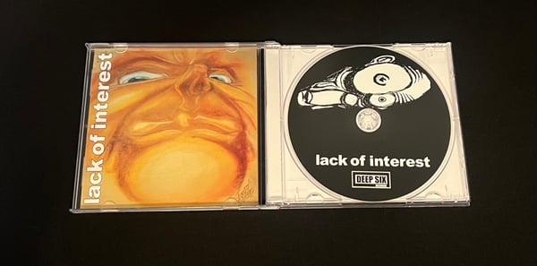 Image of Lack of Interest- Never Back Down CD