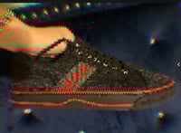 Image 1 of Black G (woman’s)