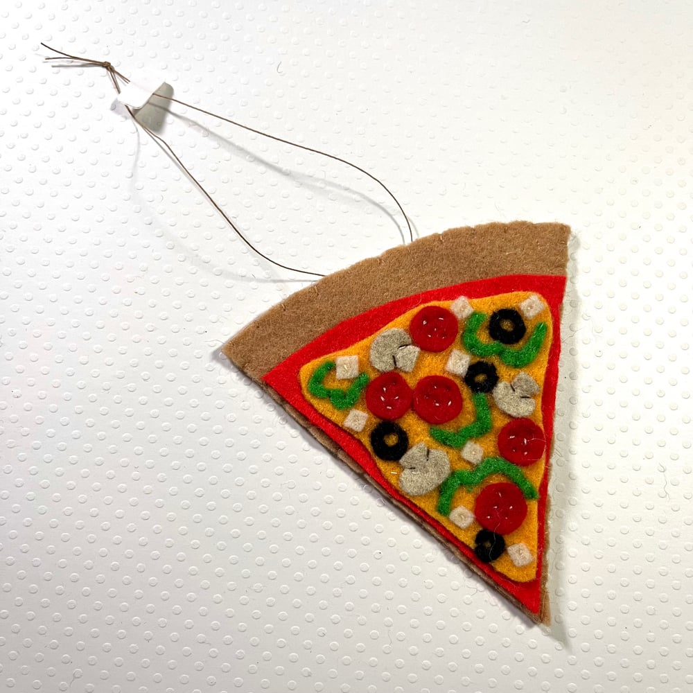 Image of the only pizza ornament of 2023 -- supreme pizza slice