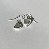 Image 1 of WHITE SKEW EARRINGS