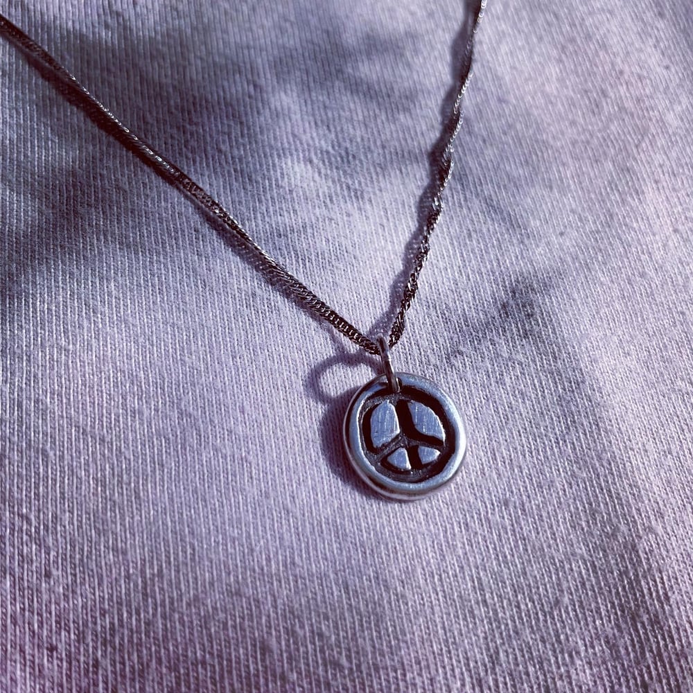 Image of Handmade fine silver Peace sign necklace. Peace hippie love sterling silver 925 pendant.