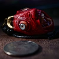 Image 14 of Egg of the King bleeding eyes pendant, adjustable cord, OOAK,