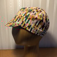 Image 1 of Cotton cycling cap - geometric multicoloured lines