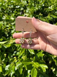 “flora funk” earrings