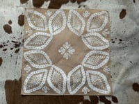 tea and white printed hankie