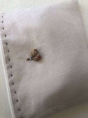 Image of Théa pale lavender linen pouch with vintage detail 