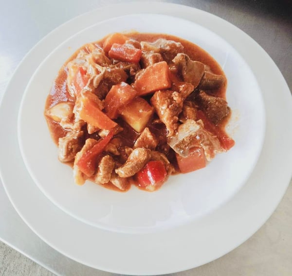 Image of Pork Caldereta includes rice and drink with free delivery.