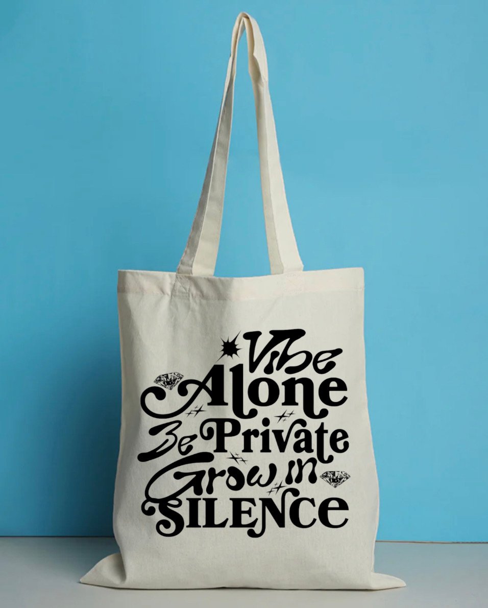 Vibe alone tote bag