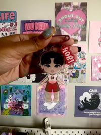 Image 5 of bangtan boyz keychains.