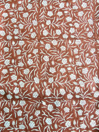 Image 2 of Namaste fabric petits œillet fond brique 