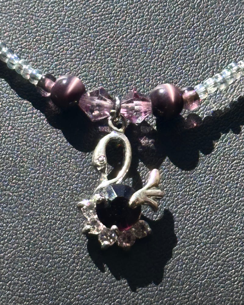 Image of purple swan necklace