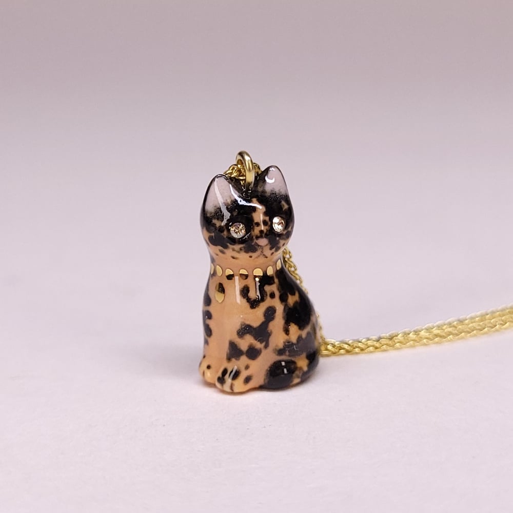 Image of Tortoiseshell Porcelain & Gold Vermeil Sitting Kitten Pendant