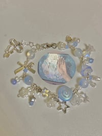 Image 1 of cluttered blue bracelet