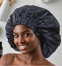 Image 1 of shower cap and bonnet
