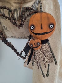 Image 1 of mama & mini pumpkin dolls set