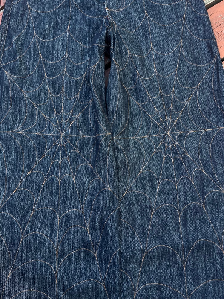 Image of denim web jeans 
