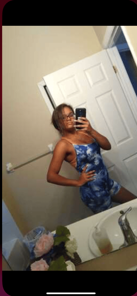 Image of Crisscross Open Back Slogan Graphic Tie Dye Unitard Romper